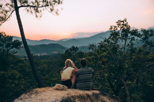 Couple Quietly Soak In The View Photo