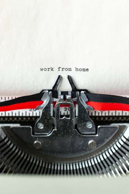 Work From Home A Typewritten Message In Portrait Photo