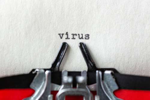 Virus A Typewritten Word In Macro Photo