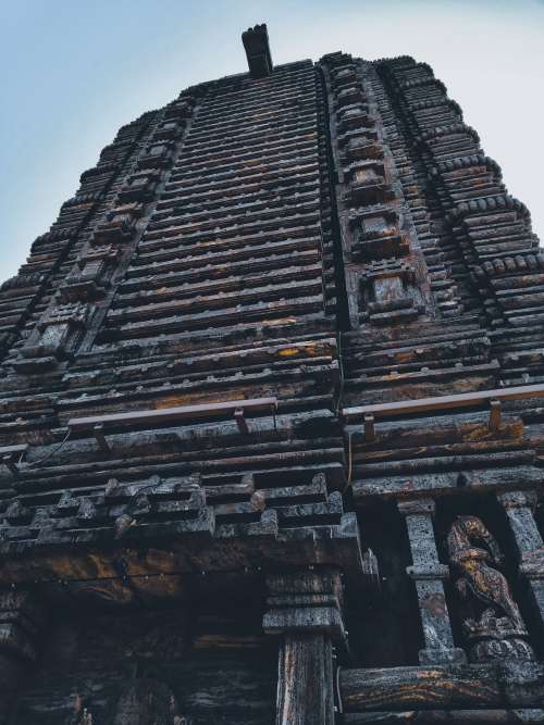 Looking Up At A Tall Temple Photo