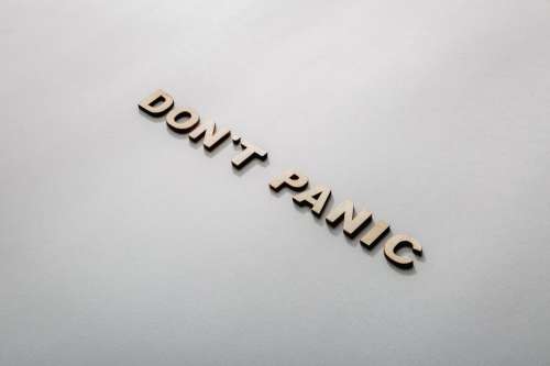 Don't Panic In Wooden Letters Photo