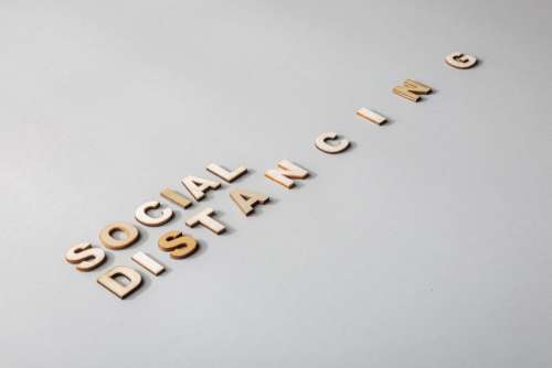 Social Distancing In Wooden Lettering Photo