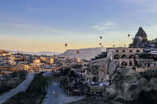 Hot Air Balloons Above Landscape Photo