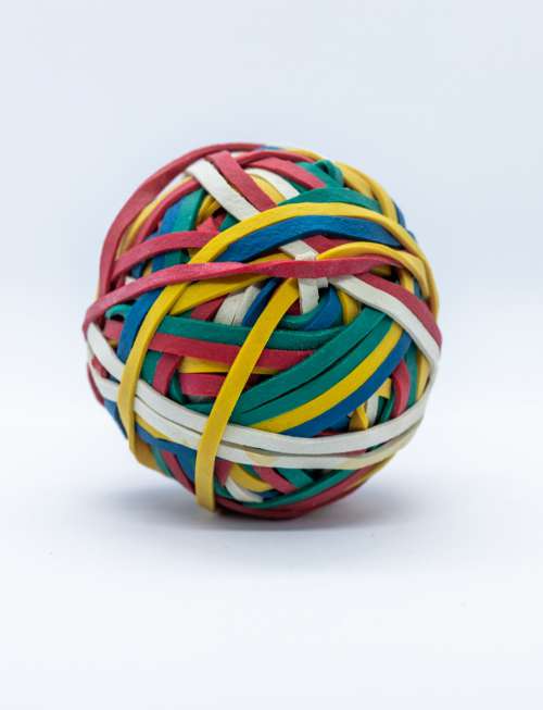 A Ball Of Rubber Bands On White Photo