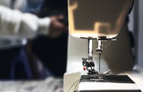 Threaded Needle On Sewing Machine Photo