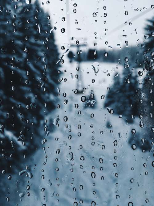 Rain Droplets On A Monochromatic Window Photo