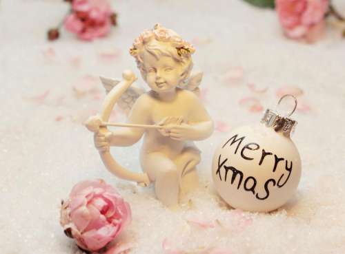 Angel figurine with Christmas Ornament