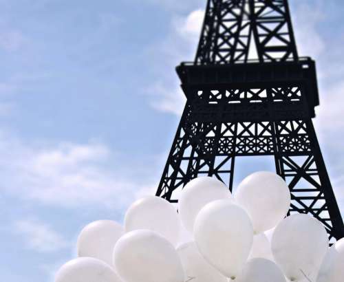 Eiffel Tower with White Balloons