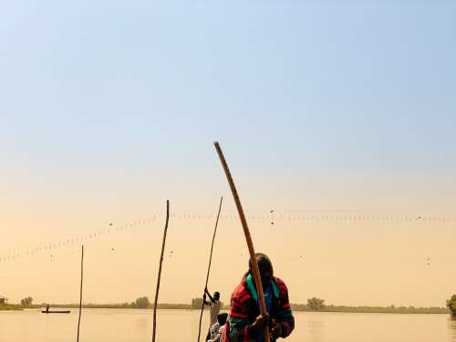 people, man, work, lake, facial expression, small boat, canoe, tourism