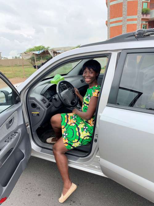 woman, smile, happiness, driver, facial expression, looking, nice, pretty, people, steering wheel, car, pose, posture, road safety, travel, means of transport
