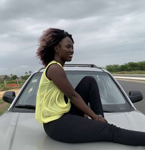 woman, car, looking, pose, posture, smile, facial expression, road trip, parking