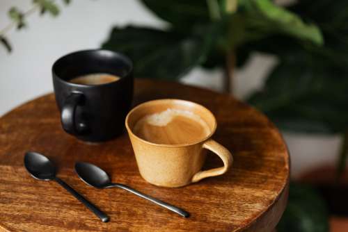 Cup of coffee on wooden table