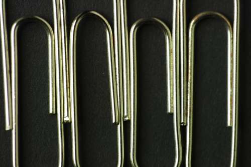 Row of silver paper clips