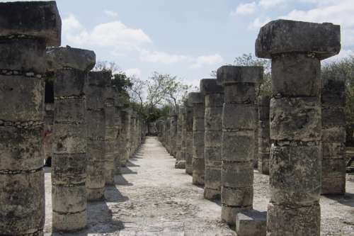 Mayan ruins at Chichen Itza, Group of 1000 Columns with cloudy sky, Yucatan, Mexico