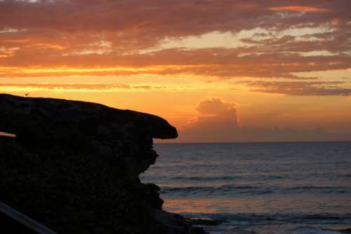 ocean cliff sunset water sea