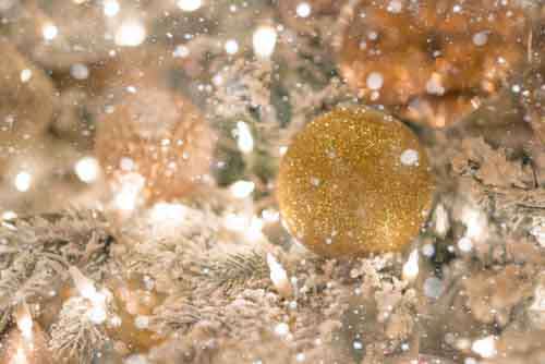 Christmas Tree Decoration With Gold Glitter Covered In snow