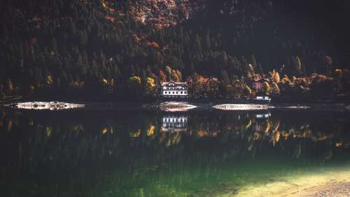 Cottages And Reflections On A Lake Photo