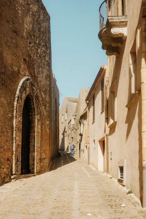 Historical Alley With Arch Doorway Photo