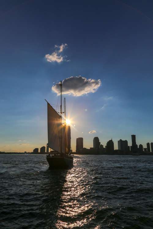 Sailing Through The City Photo