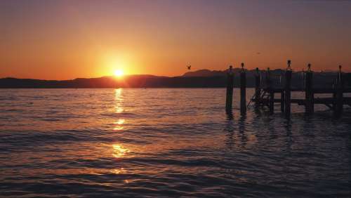 Orange Sunset Over Lake Photo