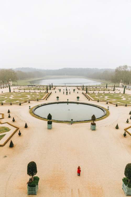 Woman In The Gardens Of Versailles Photo