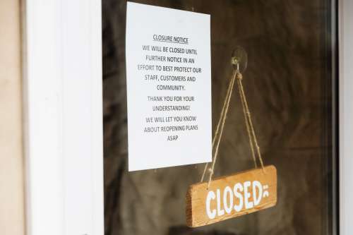 Closure Notice On Glass Door Photo