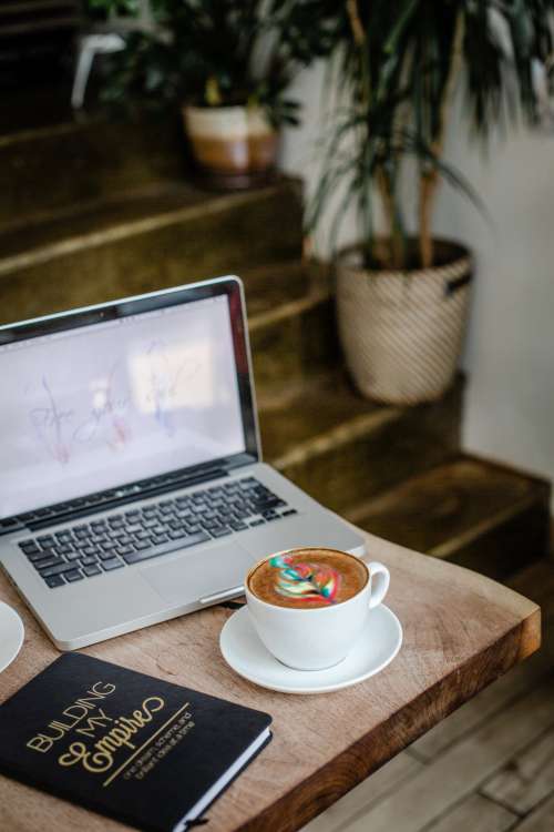 Laptop And Colourful Latte Photo