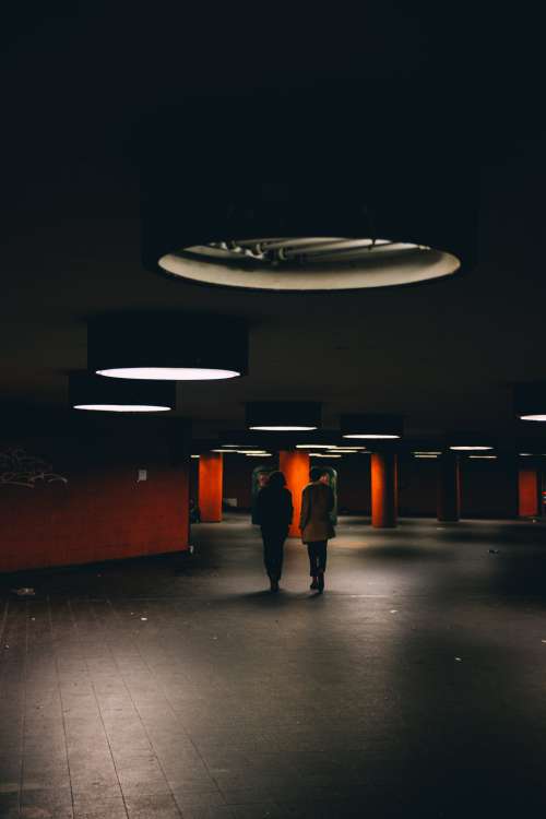 Couple Walk Through Underground Passage Photo