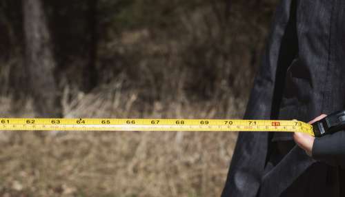 A Yellow Tape Measure Showing Six Feet Photo