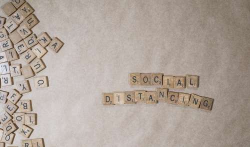 Social Distancing In Scrabble Letters Photo