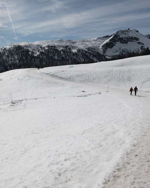 Hikers On A Snow Trail Photo