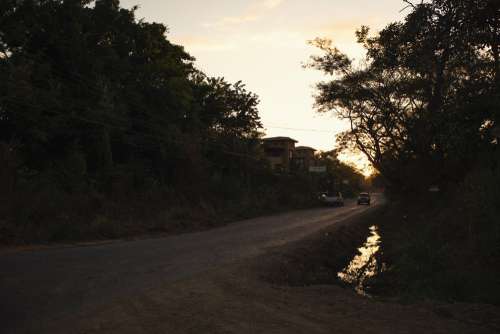 A Gravel Road At Sunset Photo