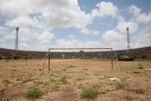 sports field, lawn, soccer stadium, football field, deserted place, place of attraction, play area, grandstand, goal