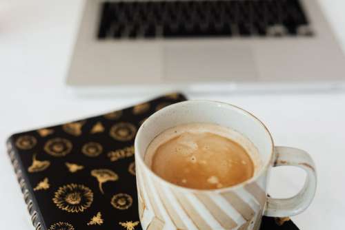 Home Office - Laptop - organizer & cup of coffee