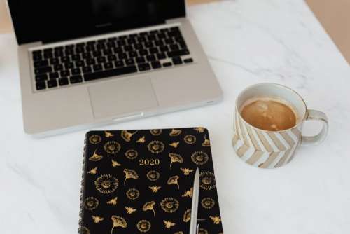 Home Office - Laptop - organizer & cup of coffee