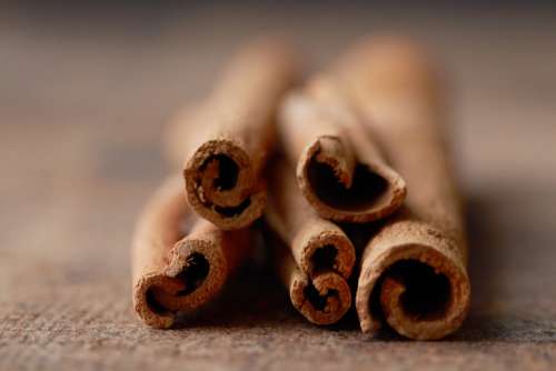 cinnamon sticks background brown texture