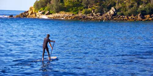 paddle boarding water person ocean