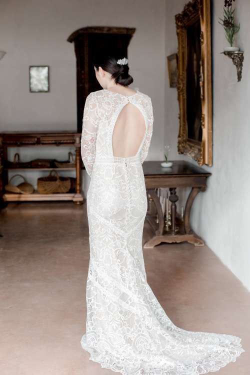 Back Of Bride Showing Their White Lace Dress Photo