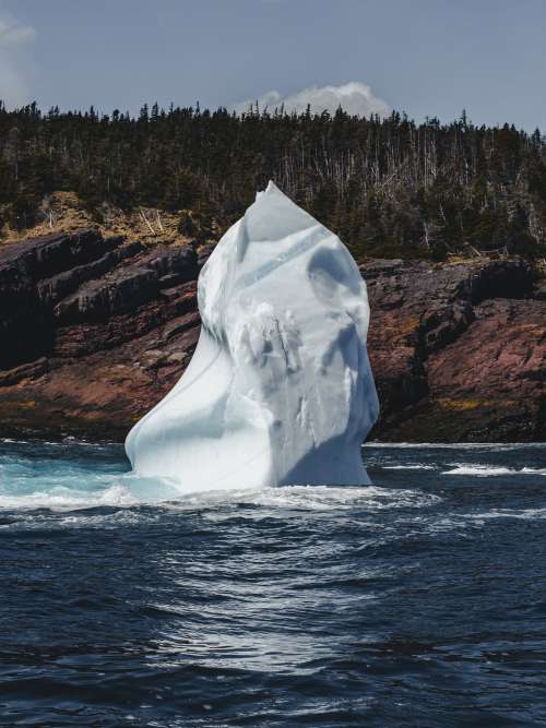 Statueque Glacier On The Water Photo