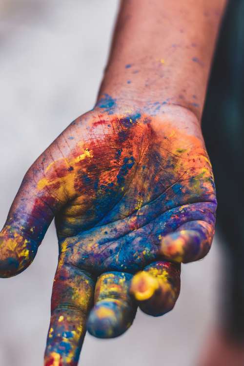 Hand Covered In Powdered Paint Photo