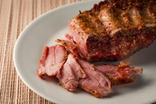 Roasted pork ribs close up