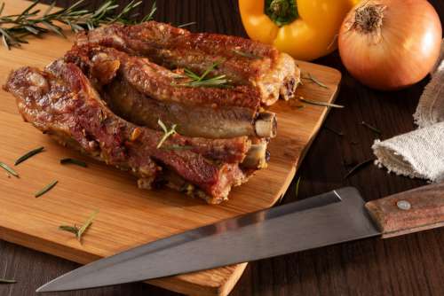 Pork ribs with knife