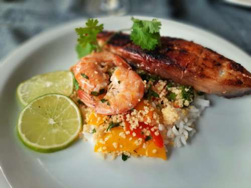 Vegetable couscous with shrimps and fish