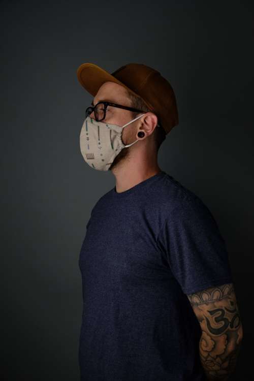 Profile Of Man Wearing Mask Photo