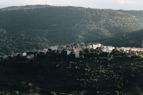 Clustered Houses On A HIll Photo