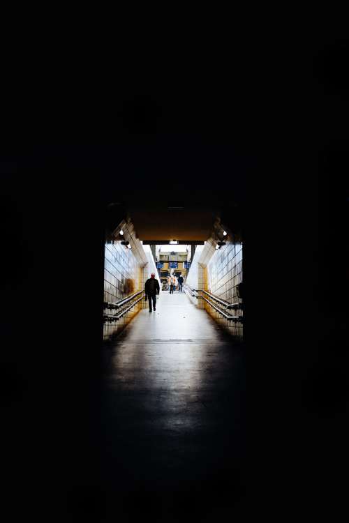 Darkness Engulfing Subway Exit Photo