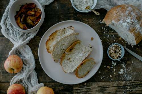 Flat Lay Of Baked Bread With Apples And Oats Photo