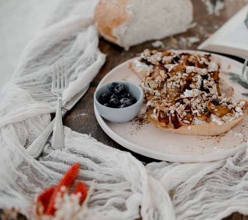 Fresh Bread Covered In Fruit And Oats Photo