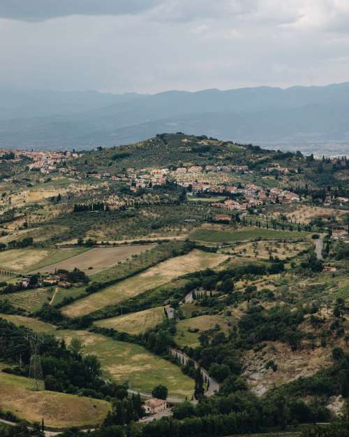 Italian Hillside Town In Vast Landscape Photo