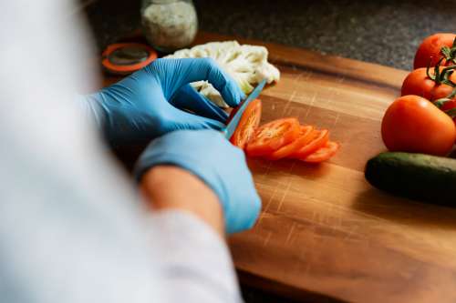 Food Preparation With Protective Gloves Photo